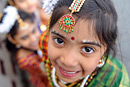 A close up of a girl smiling at the camera