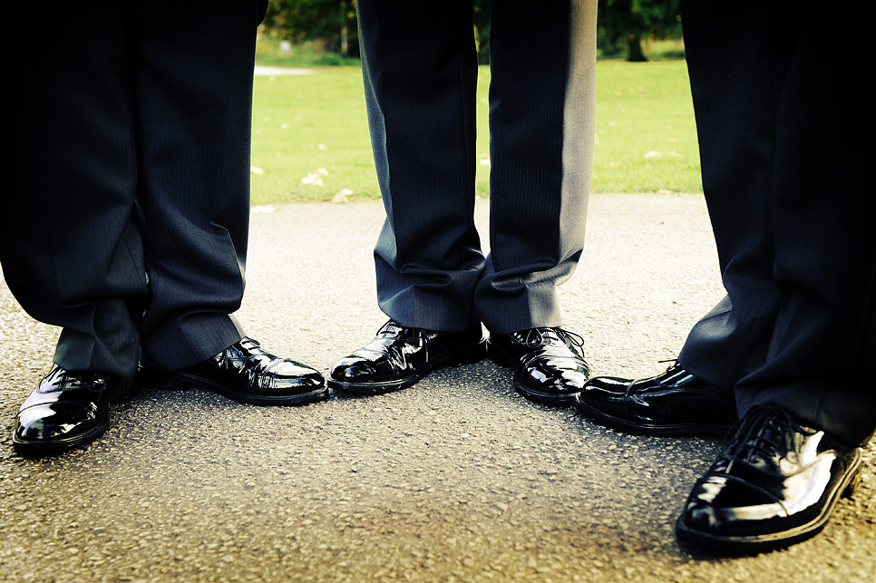 Groomsmen sporting their shiny shoes